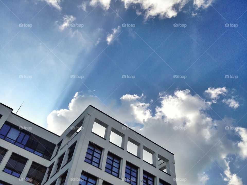 Office building with dramatic sky 