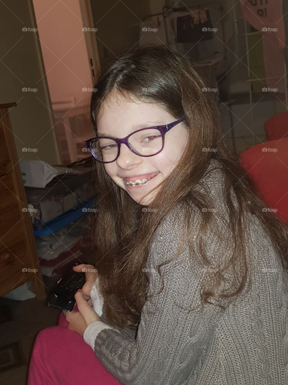 portrait of a little girl with long brown hairs