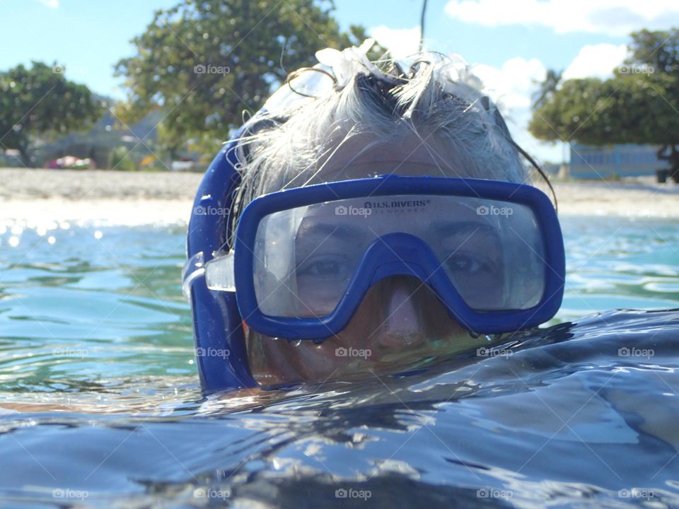 Rising from the warm Caribbean waters selfie snorkeling