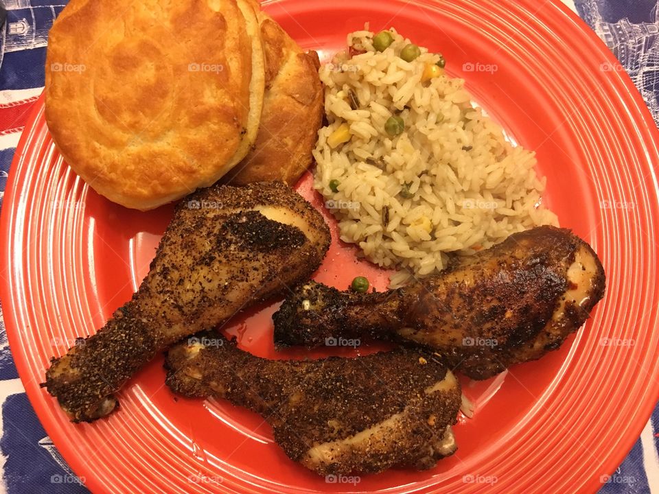 Drumsticks, rice, and biscuits