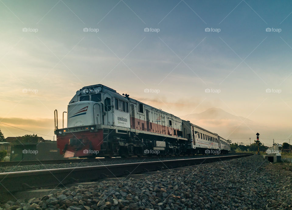 night train and volcano in the background