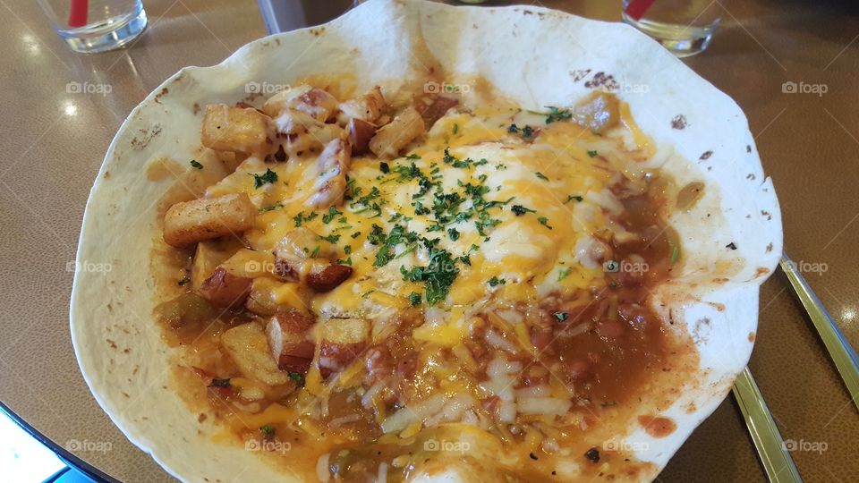 Heuvos Rancheros in a tortilla bowl