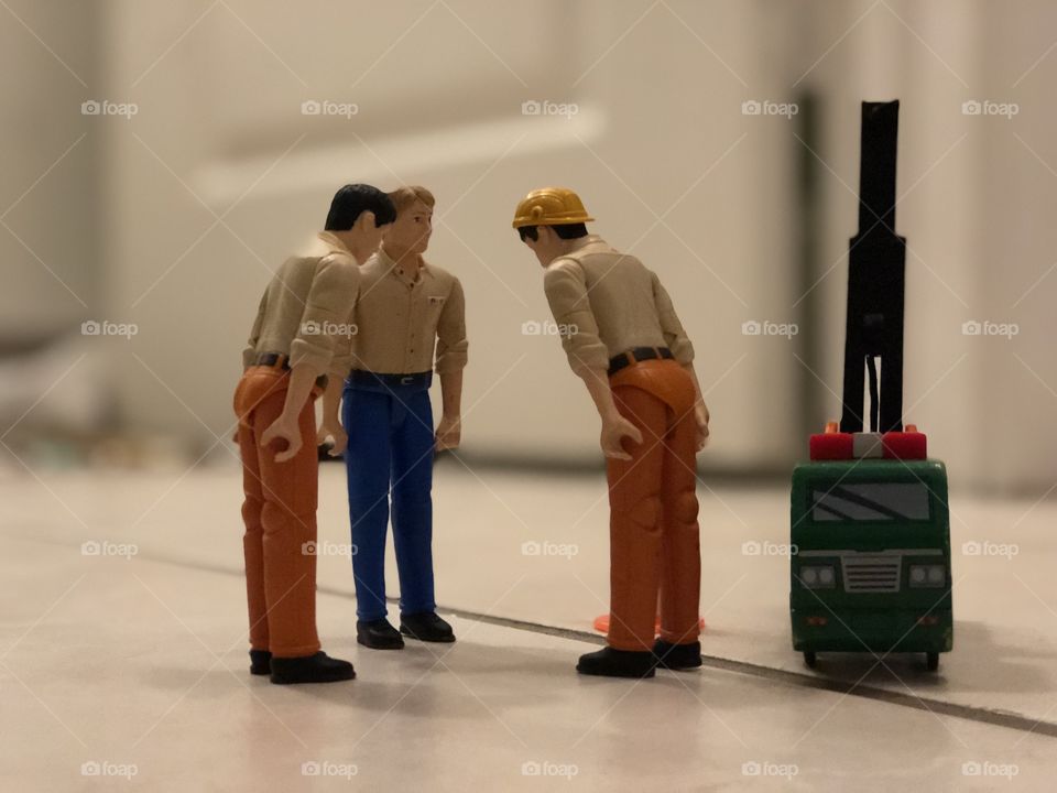 The work crew discusses a big problem