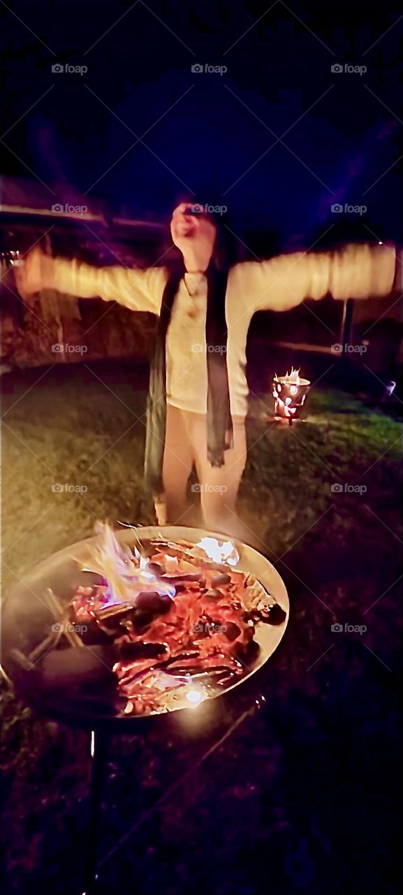 The tradition of lighting bonfires has not stopped in parts of the World such as here in this garden in “Bavaria”, Germany. 2022. Hypnotic Productions