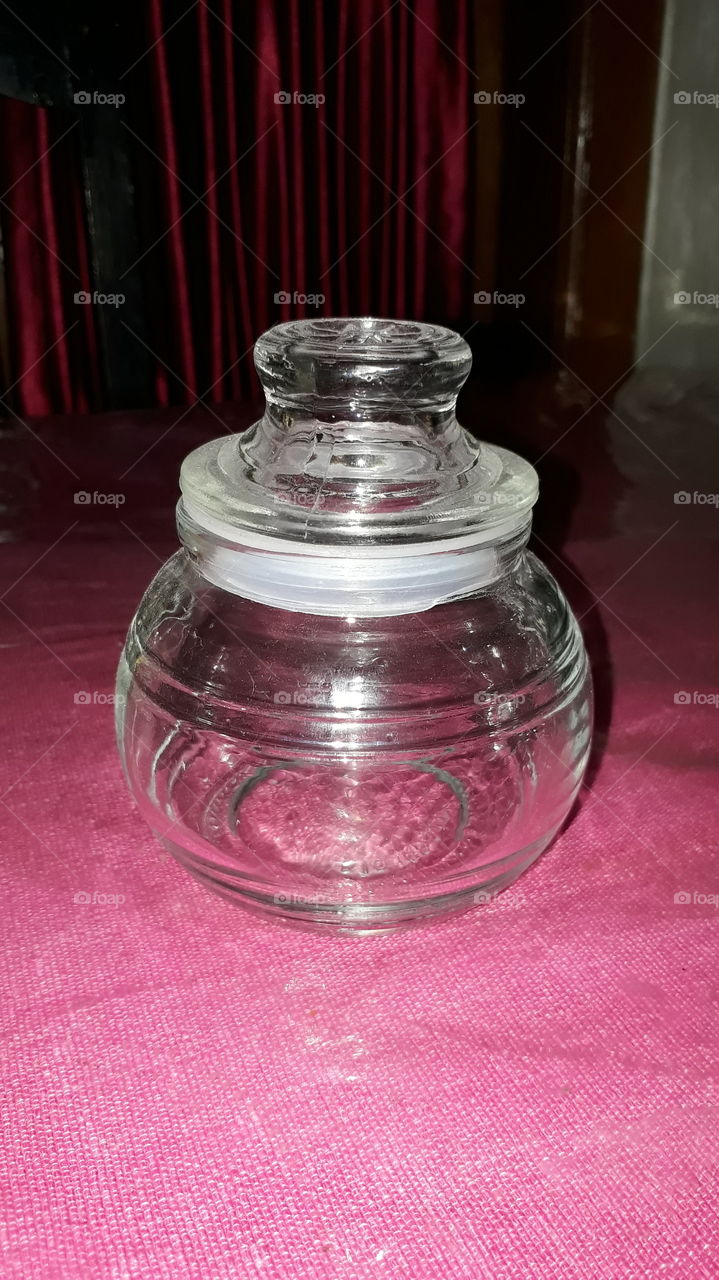 Mini round jar, clear and uniqe.
