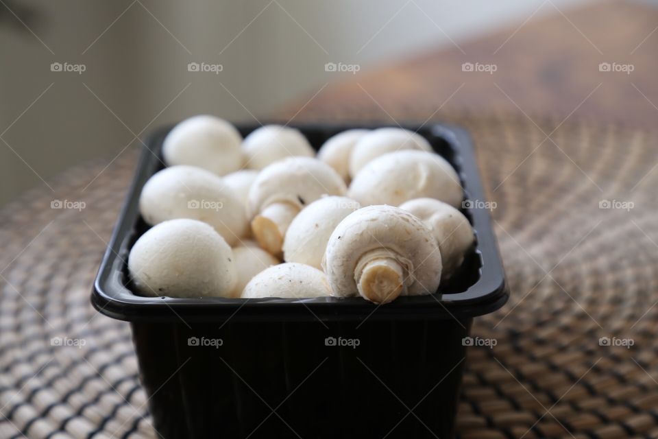 Mushrooms in a box