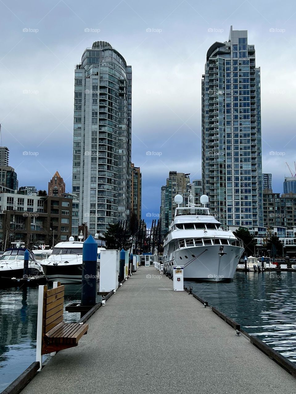 Walking down a dock at False Creek Harbour in Downtown Vancouver 