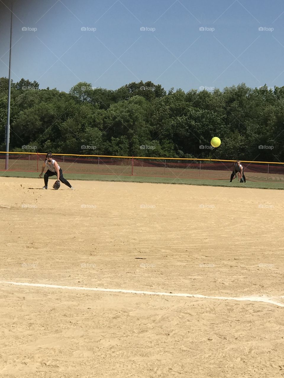 Fielding the softball 