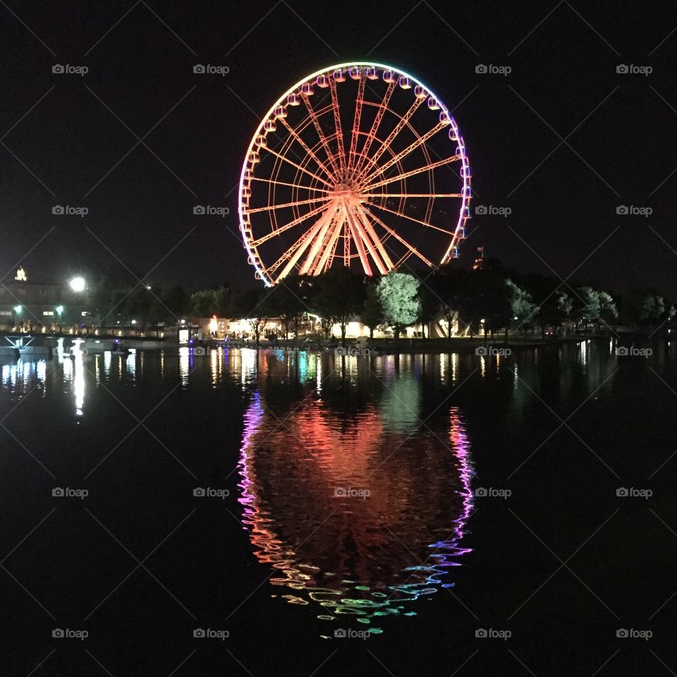 Montreal’s Big Wheel at night reflected in the water
