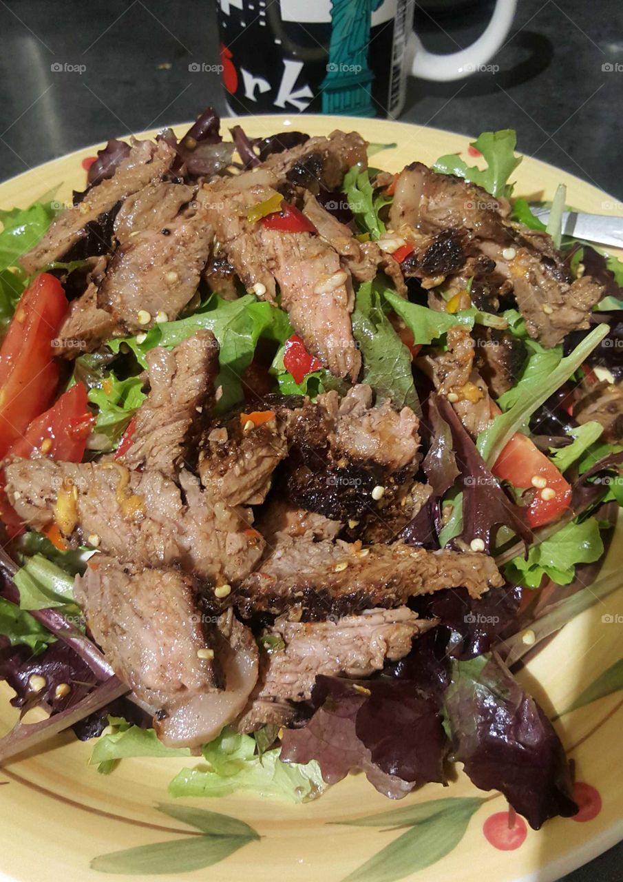 #Beef salad,
Ones again I took this picture from my Samsung galaxy S6 
it's Beef salad Thai style hot chili sauce with mix Green Leaf if you like spicy food this one is a good with red wine.