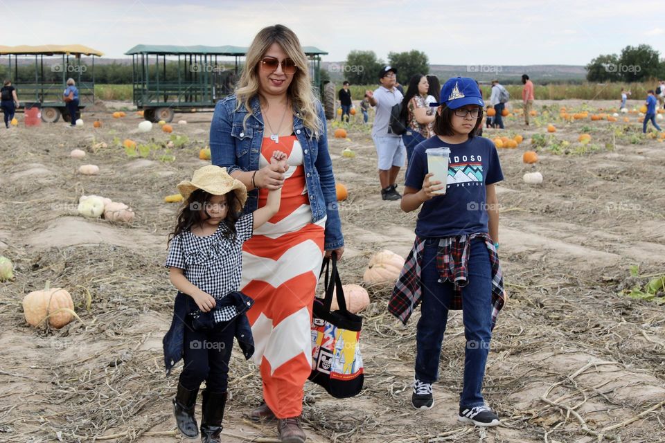 Daughter, Mom and Son Enjoying a Quality Time 