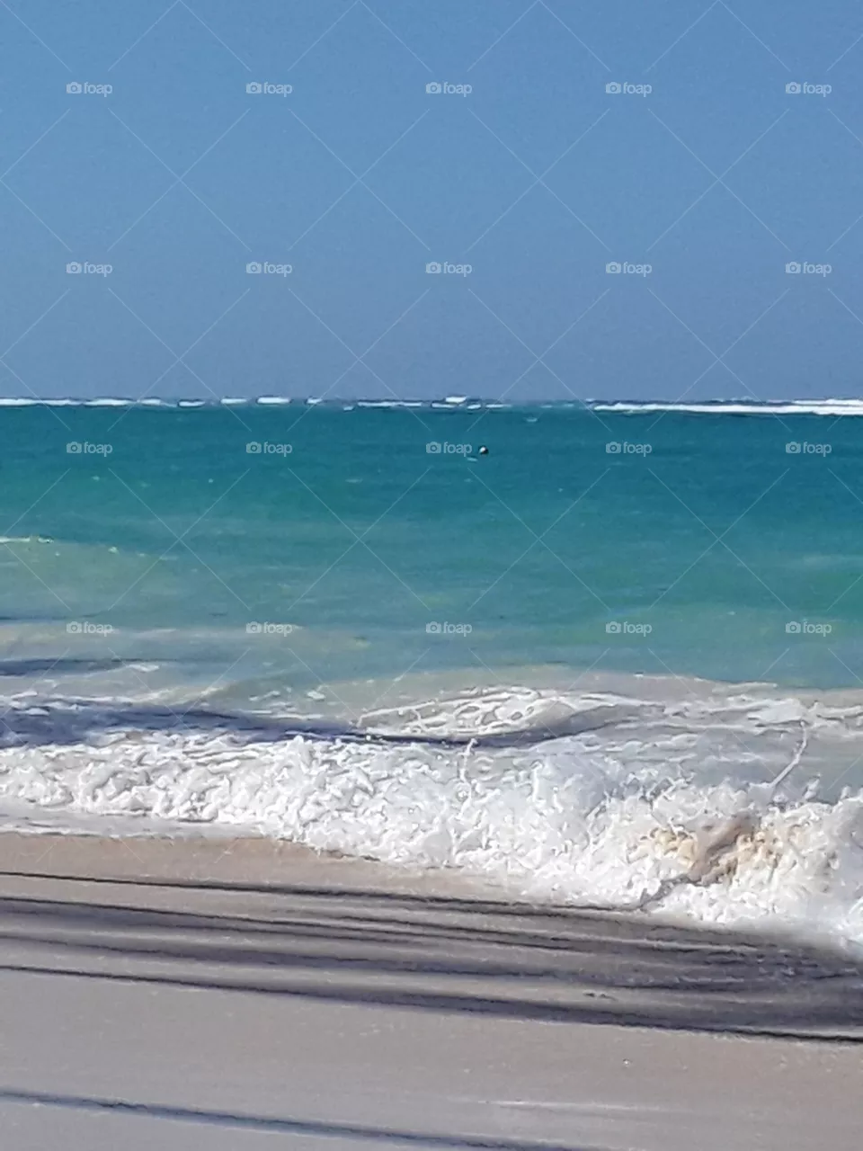 the ocean is like a child constantly in motion and changeable in its mood