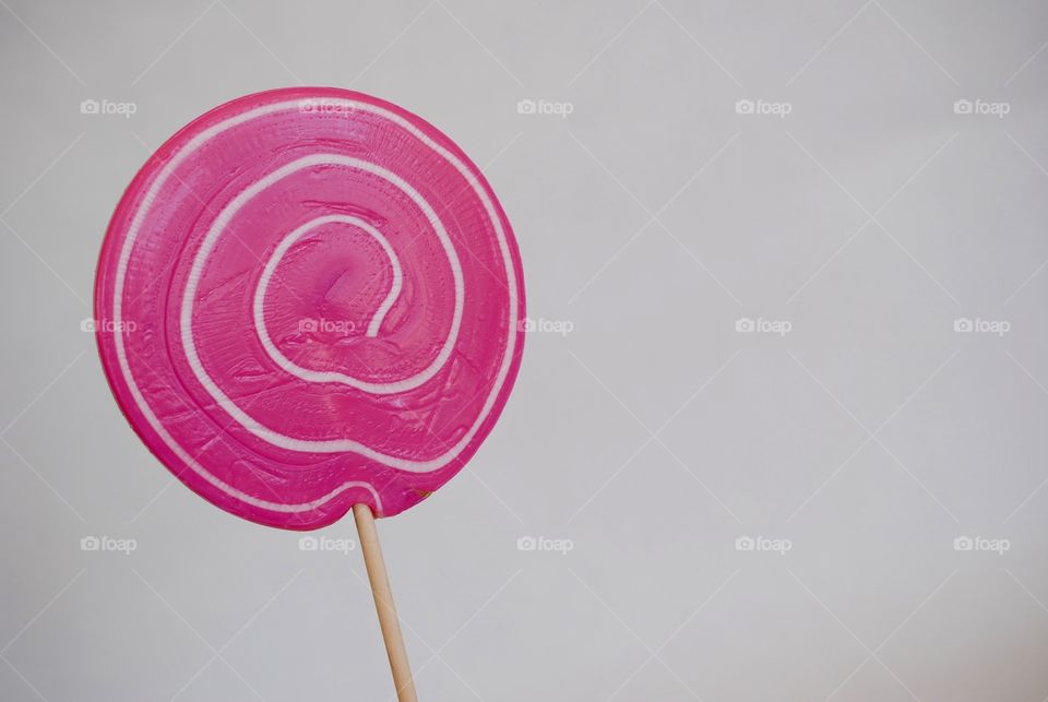 Close-up of pink lollipop