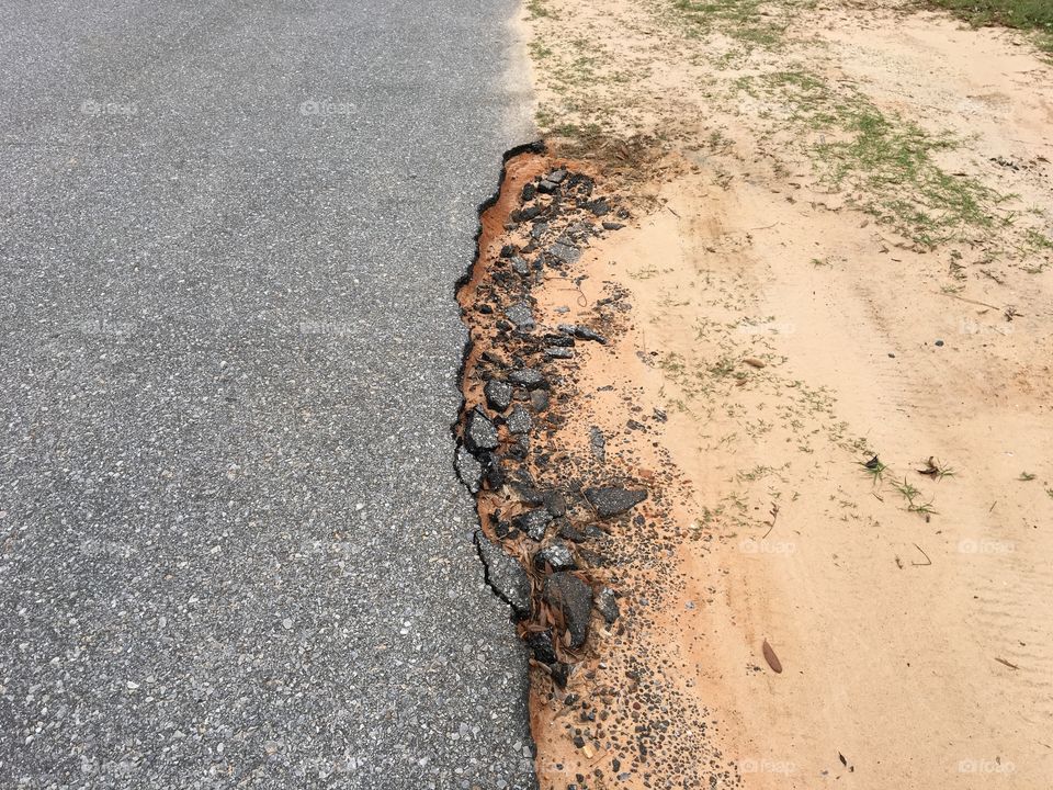 Crumbling sidewalk
