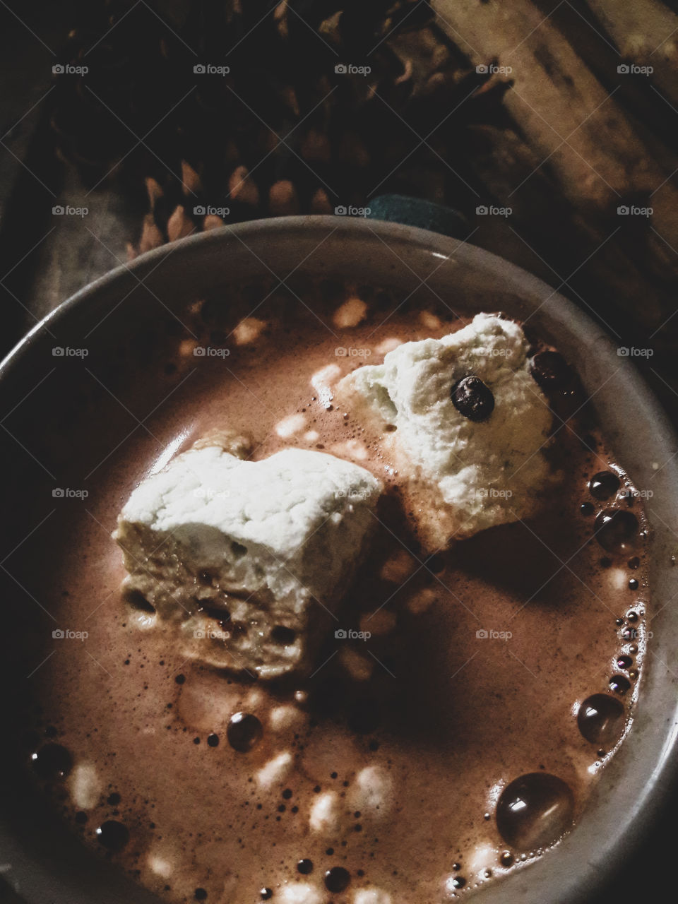 Hot chocolate with marshmallows on a cold winters night.