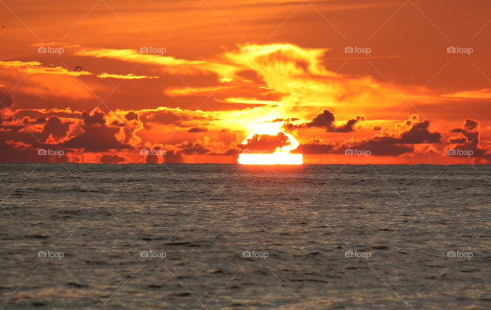 Melting ocean sunset