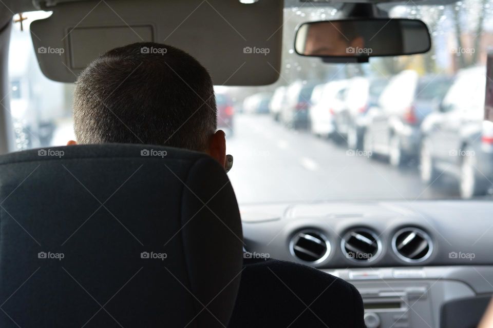 driver on a car window road view