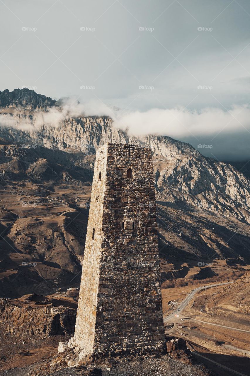 ancient stone tower in Caucasian mountains