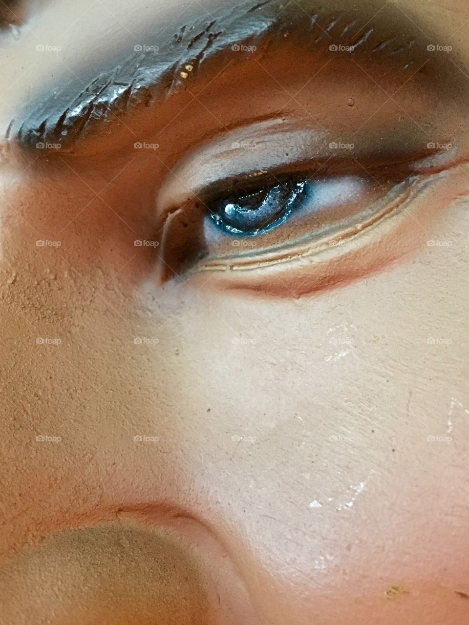 Closeup eye from statue of Elvis Presley sculpture 