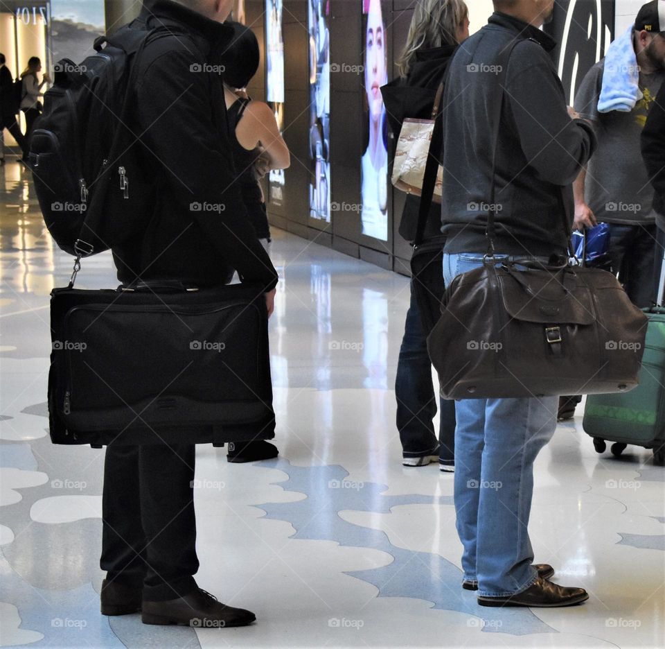 Business men in line for coffee