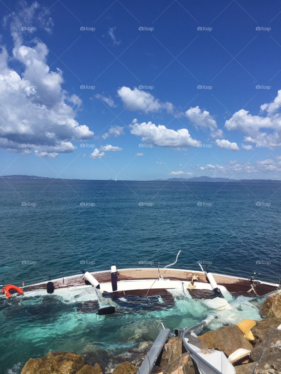 Abandoned damaged sailboat 