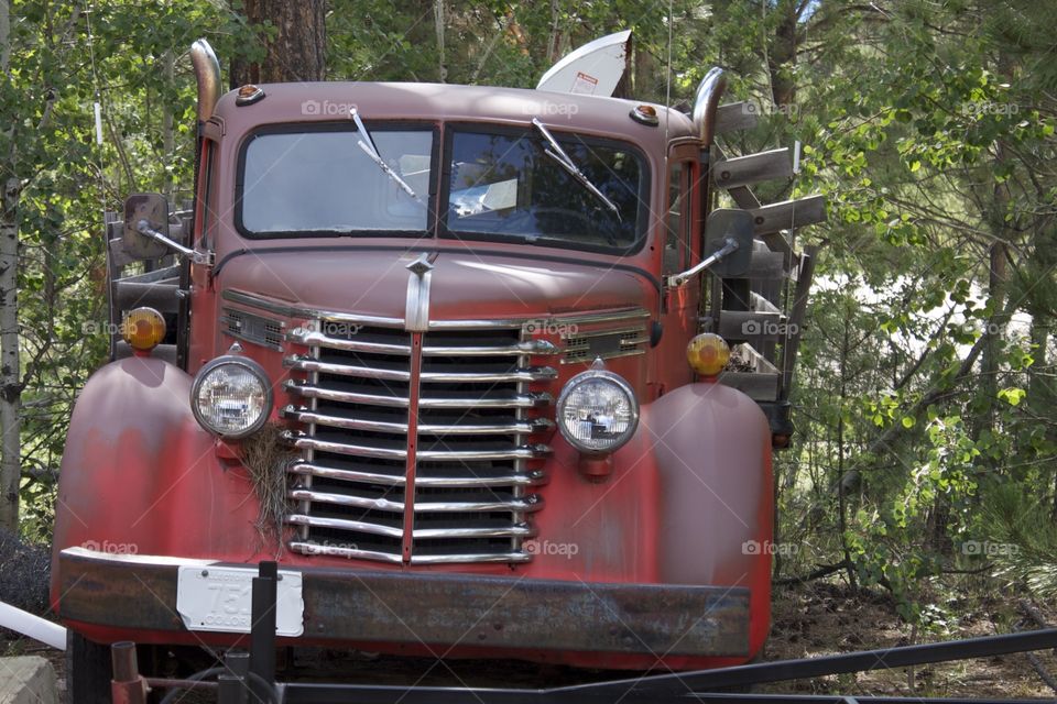 Old red forgotten truck 