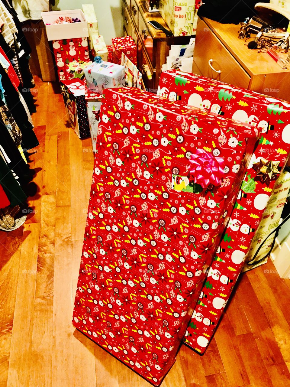 Fun rectangular presents sitting in closet waiting to be delivered at Christmas time!! 