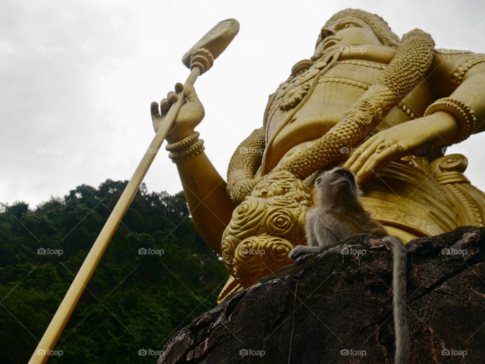 This is a picture of the enormous statue in front of the Batu Caves 