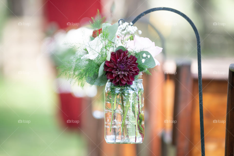 Red and Pink Roses in Mason Jars