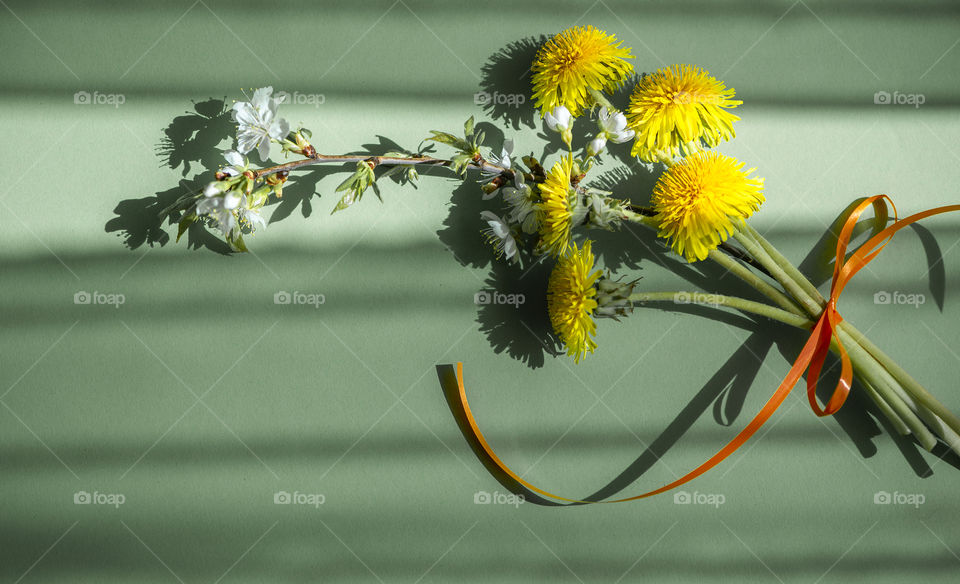 Flower bouquet isolated on green background