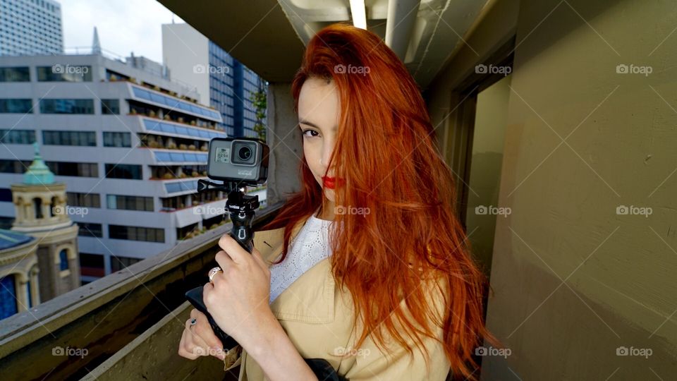 Beautiful Red Head shooting with that New GoPro climbing buildings and jumping rooftops 