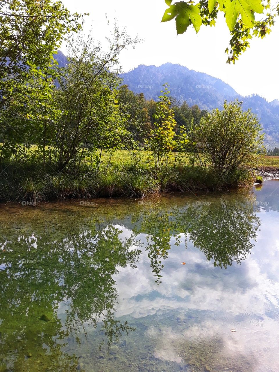 At the edge of water