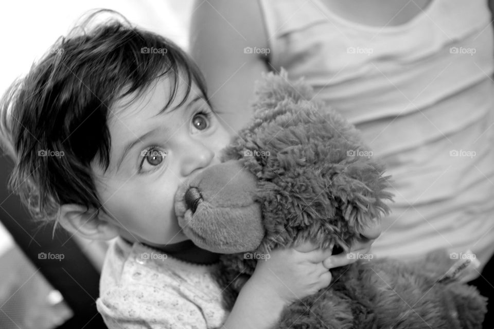 She loves her Teddy bear 