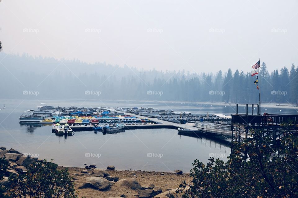 Pine Crest Lake was covered with smoke during the wild fire.