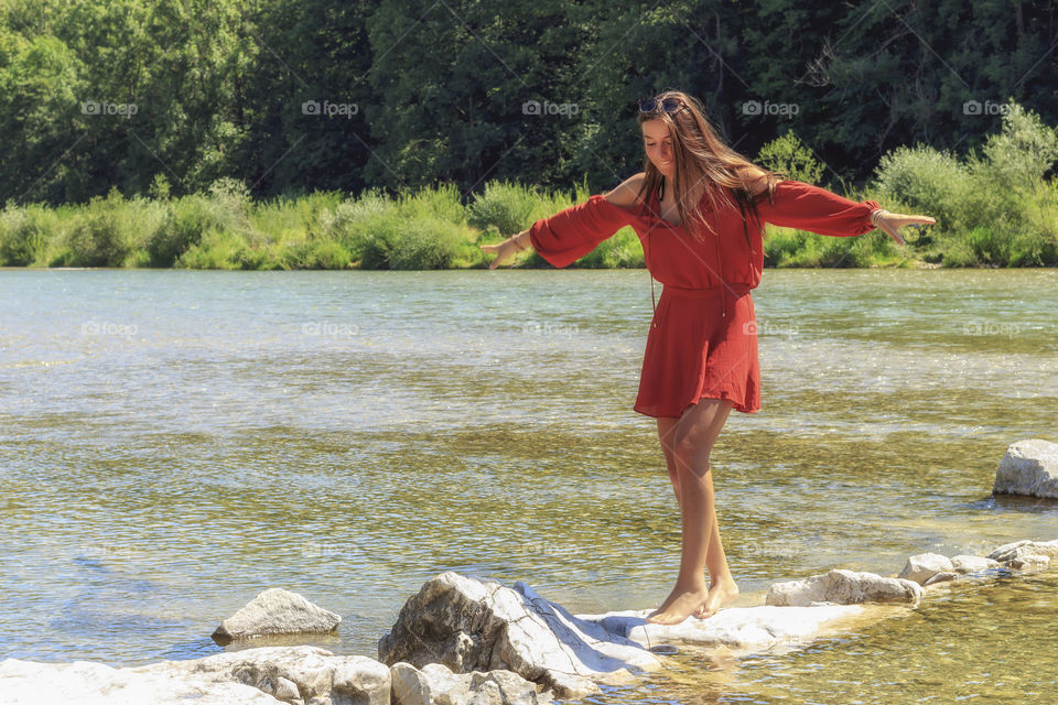 A girl is enjoying herself on the lake