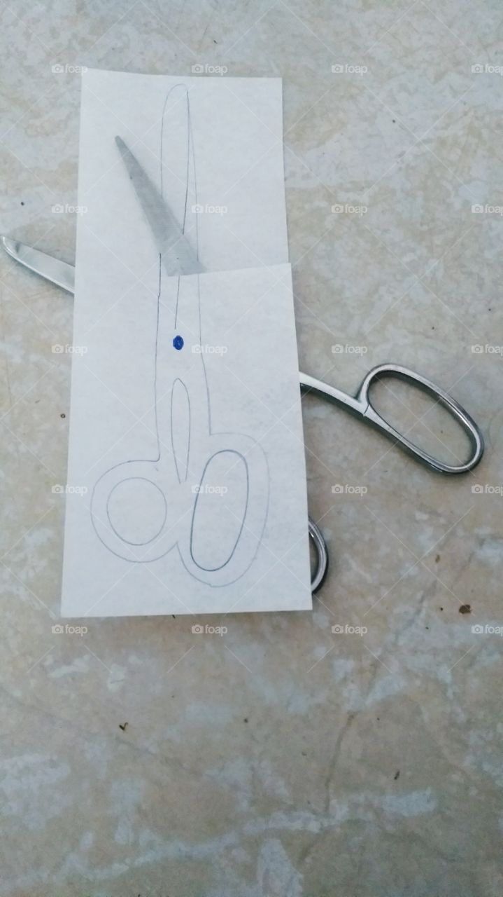 scissors cuts other scissors