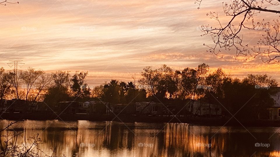 Clouds and More Clouds must catch them when colors are represented. Reflections of the landscape mirrored on Lake Waters. 