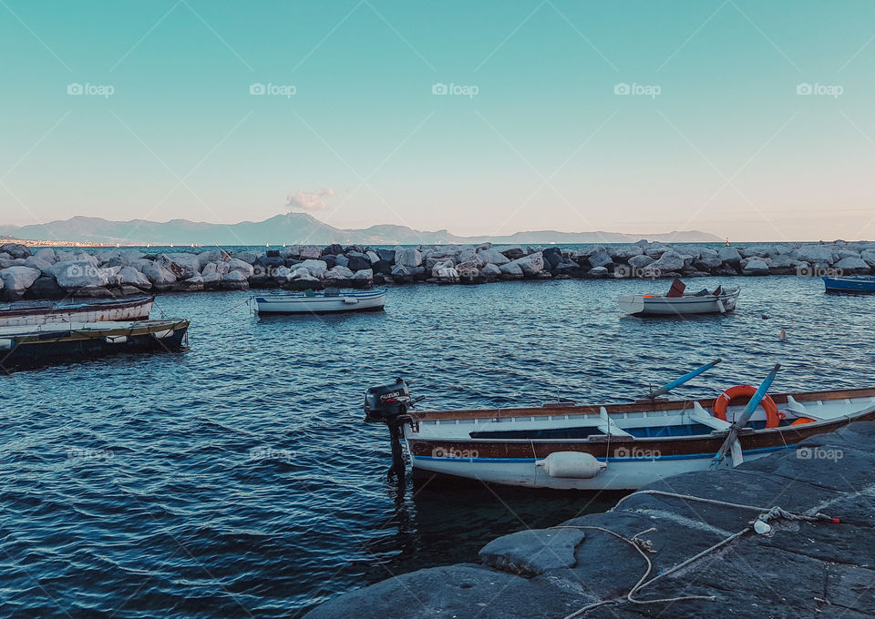 Waterscape with boats in Napoli during day 