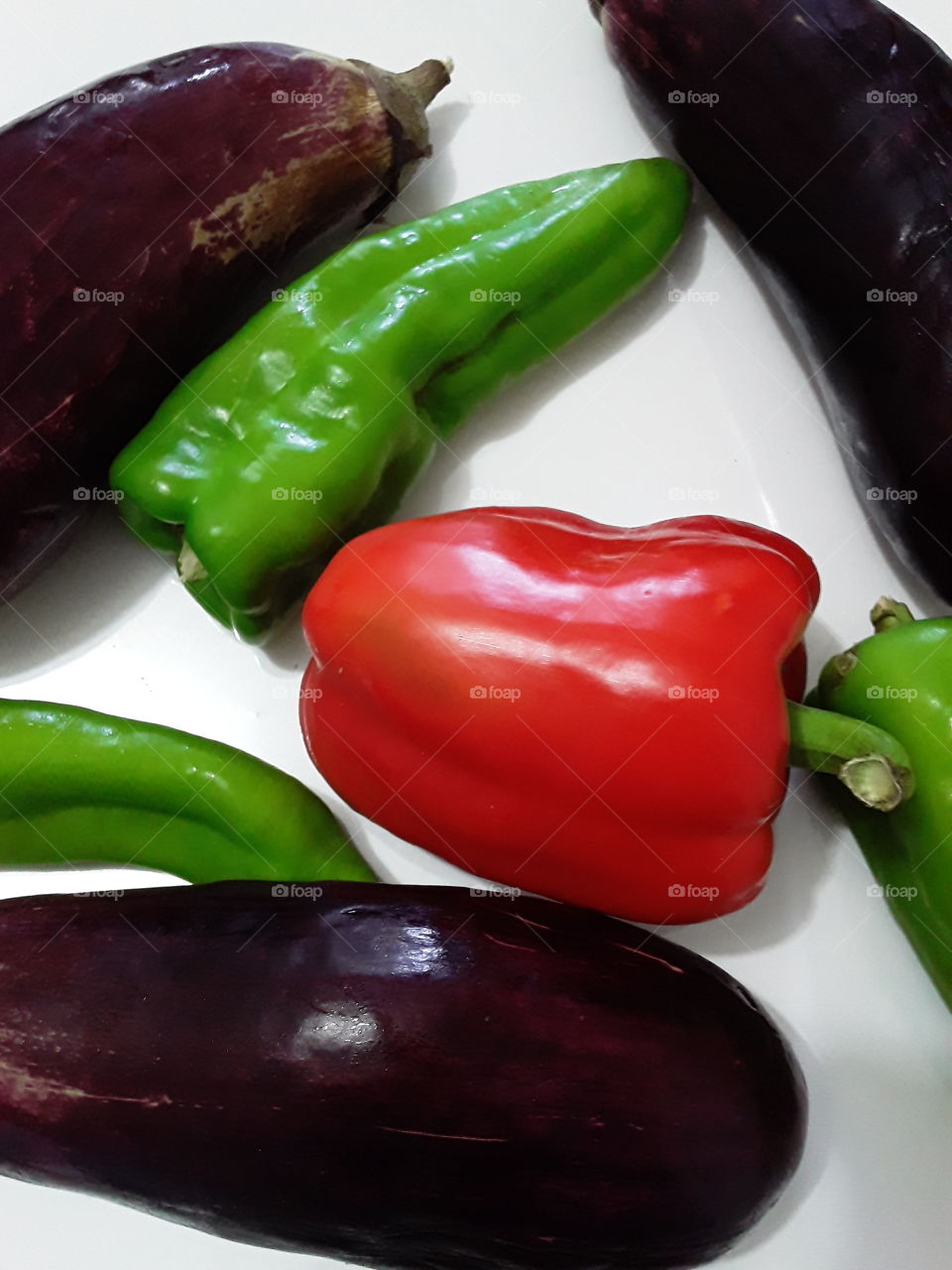 red and green peppers and eggplant