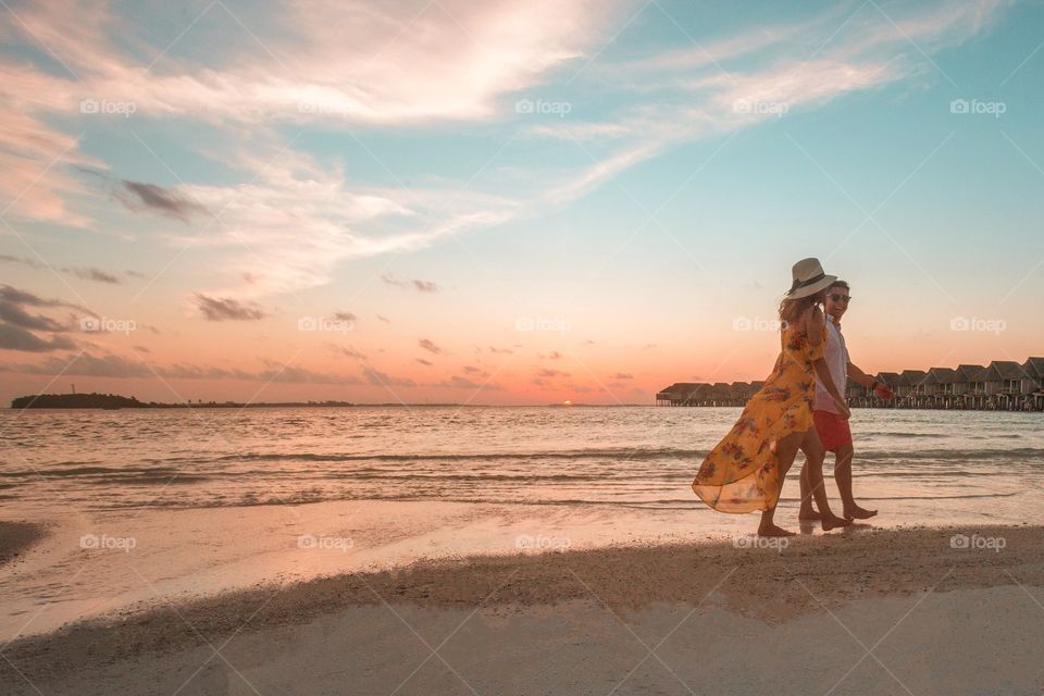 Everything that makes me happy in one picture. Watching the sunset, traveling, the beach, walking in the sand, enjoying the outdoors and spending time with my husband! 