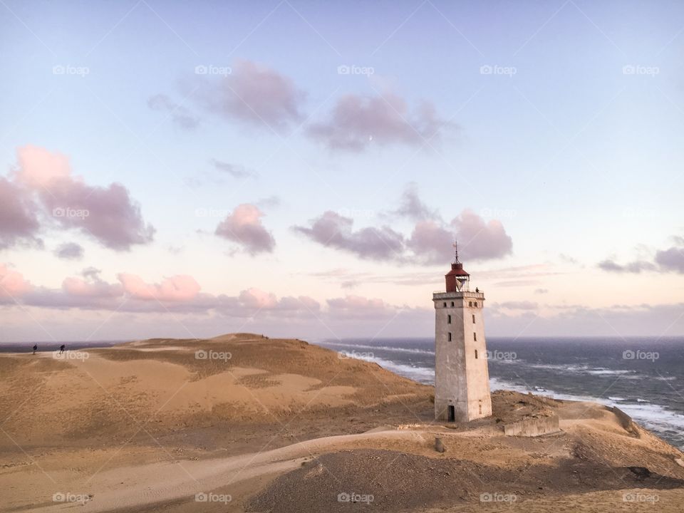 A small lighthouse at the coastline