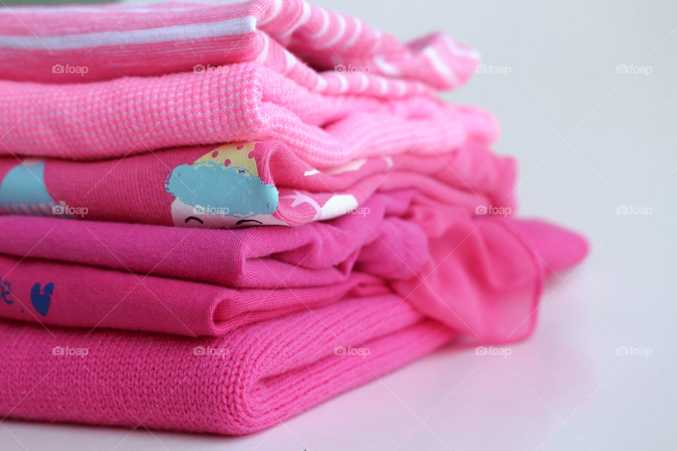 Stack of pink clothes