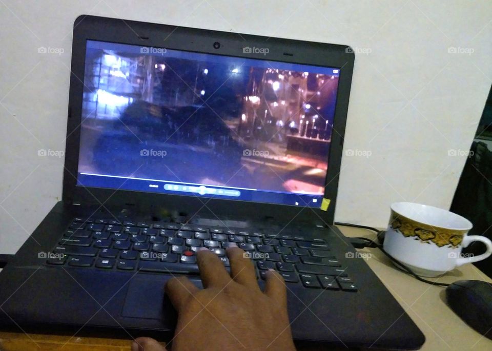 Watching movie on laptop