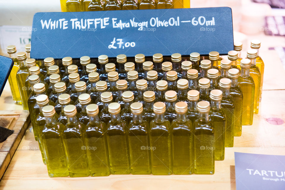 Sales of truffle oil on the food market, Borough Market in London.