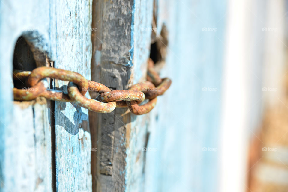 Close-up of old metallic chain