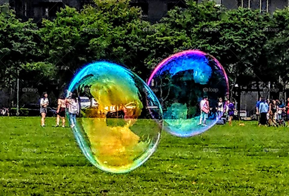 The big bubbles were found in the park, it is a fun game and children very enjoy this, their colors look so brilliant and beautiful, very attractive to people.