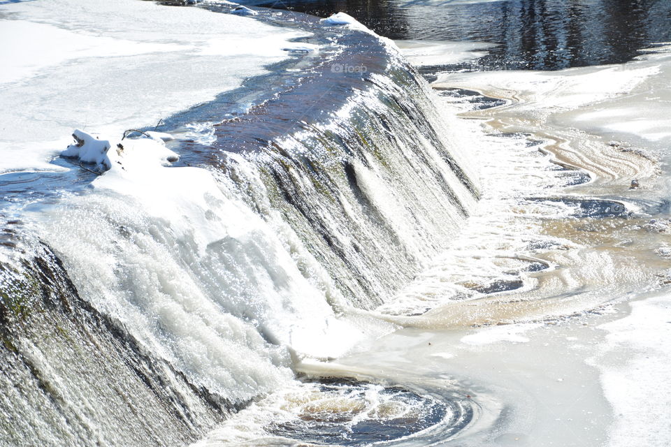 Signs of Winter. iced waterfall