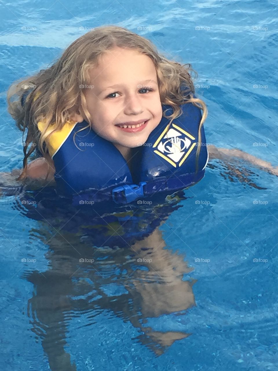 Girl swimming in pool