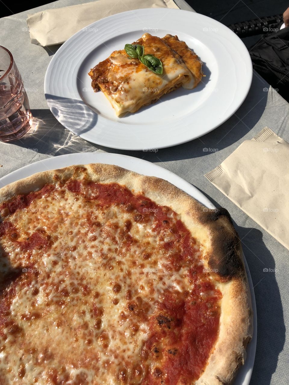 Cheesy pizza and lasagna