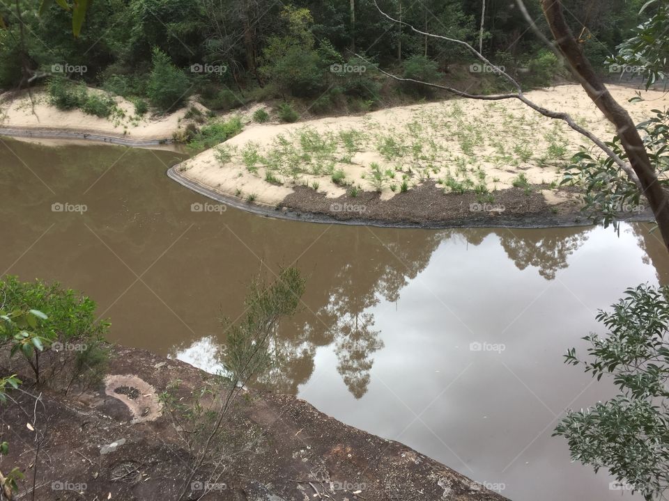 View of island with muddy water